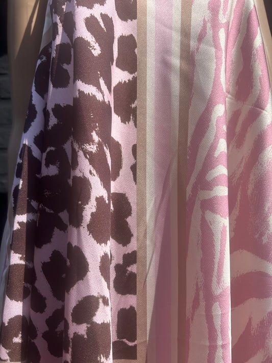 Luchtige asymmetrische top in verschillend prints beschikbaar