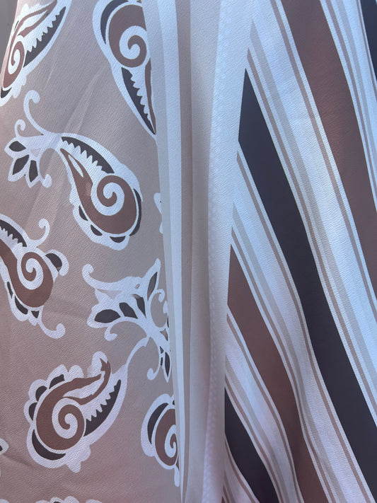 Luchtige asymmetrische top in verschillend prints beschikbaar