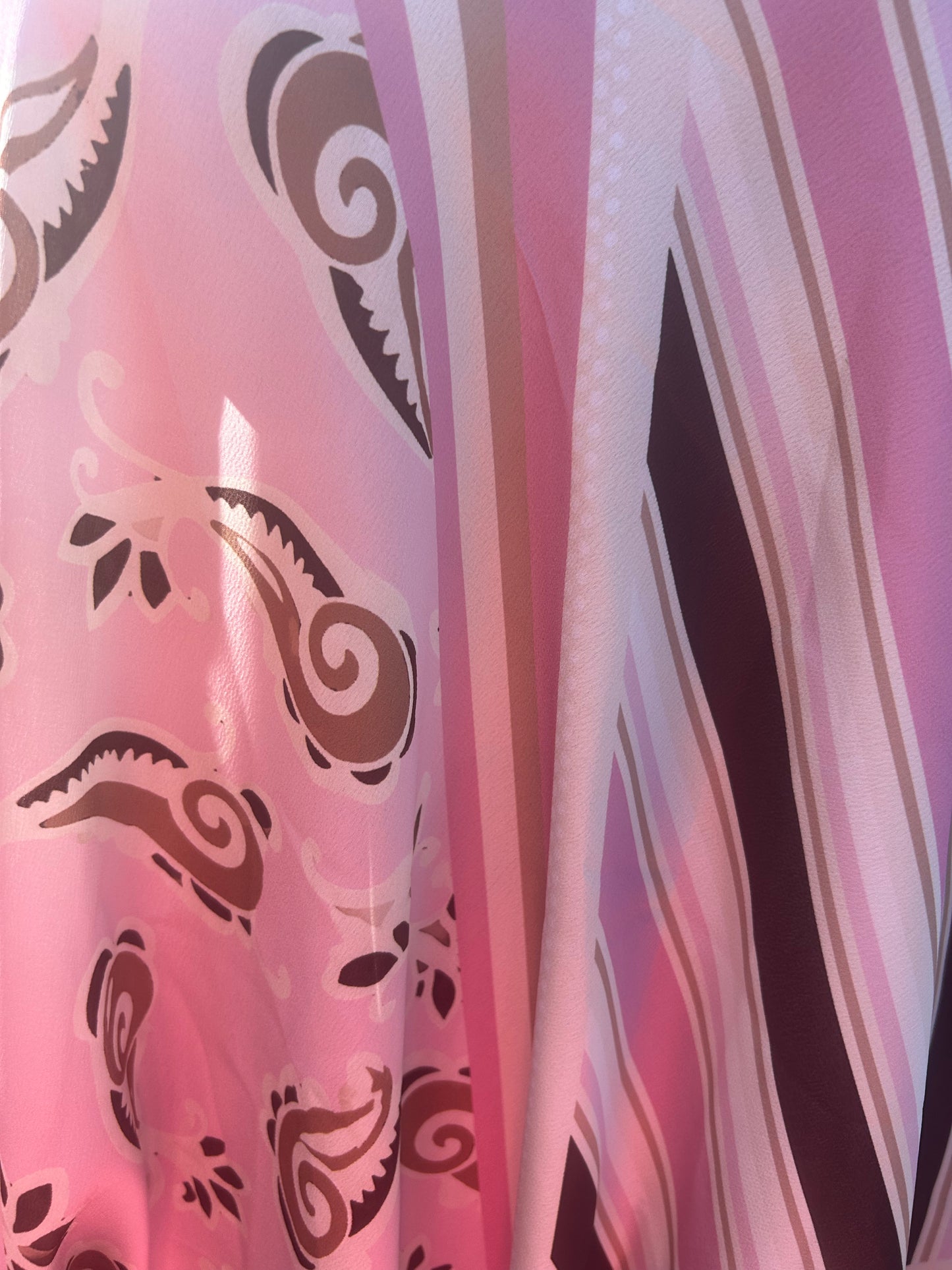 Luchtige asymmetrische top in verschillend prints beschikbaar