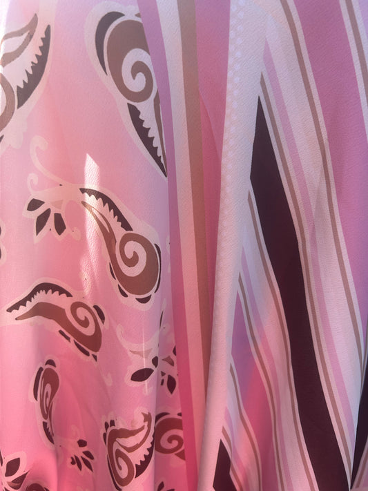 Luchtige asymmetrische top in verschillend prints beschikbaar
